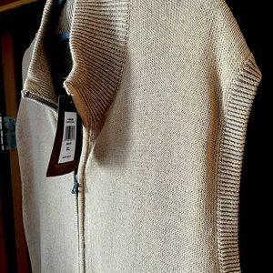 Zip up sweater vest great for fall weather.